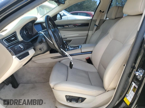 2009 BMW 7 Series 750i with VIN WBAKA83539CY33392, listed as a Copart auction lot 69851964 with 154,888 mi miles and Salvage Title. Bid and sale history available at DreamBid. Image 7.