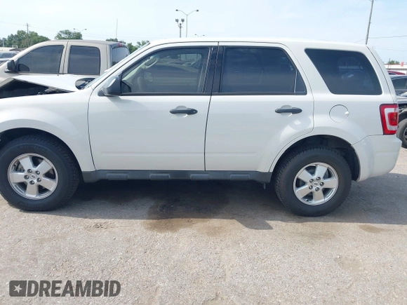 2012 Ford Escape XLS with VIN 1FMCU0C73CKA96298, listed as a IAAI auction lot 42280695 with 106,454 mi miles and . Bid and sale history available at DreamBid. Image 14.