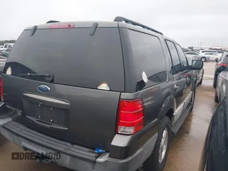 2005 Ford Expedition Special Service with VIN 1FMPU15545LA40791, listed as a IAAI auction lot 41823519 with 156,915 mi miles. Bid and sale history available at carsss.com. Image 4.