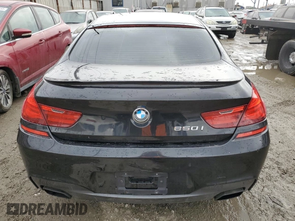 2014 BMW 6 Series 650i z VIN WBA6B2C5XED128959, wystawiony jako Copart lot #44201745 z przebiegiem 146 875 mil mil oraz Szkoda całkowita • Salvage title. Historia ofert i sprzedaży dostępna na DreamBid. Obrazek 6.