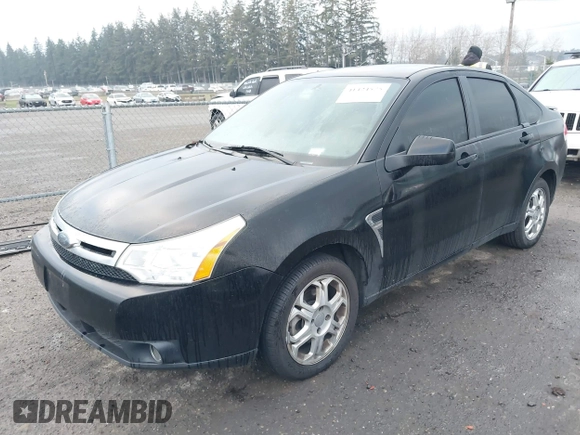 2008 Ford Focus SE with VIN 1FAHP35N08W105379, listed as a IAAI auction lot 41424575 with 210,985 mi miles. Bid and sale history available at carsss.com. Image 2.