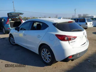 2014 Mazda 3 i Grand Touring with VIN JM1BM1M7XE1102093, listed as a IAAI auction lot 41344433 with 148,395 mi miles and . Bid and sale history available at DreamBid. Image 6.