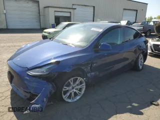 2023 Tesla Model Y Long Range z VIN 7SAYGDEE8PF628512, wystawiony jako Copart lot #54702455 z przebiegiem 20 880 mil mil oraz Szkoda całkowita • Salvage title. Historia ofert i sprzedaży dostępna na DreamBid. Obrazek 1.