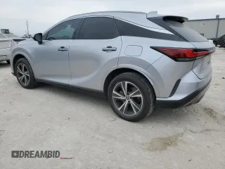 2023 Lexus RX with VIN JTJCHMAA1P2000332, listed as a Copart auction lot 82367934 with 23,946 mi miles and Salvage Title. Bid and sale history available at carsss.com. Image 2.