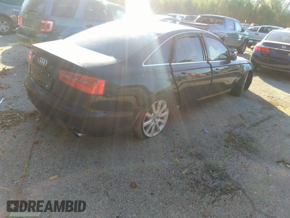2014 Audi A6 Premium Plus z VIN WAUGFAFC7EN042581, wystawiony jako IAAI lot #34712557 z przebiegiem Nie podano mil oraz . Historia ofert i sprzedaży dostępna na DreamBid. Obrazek 4.