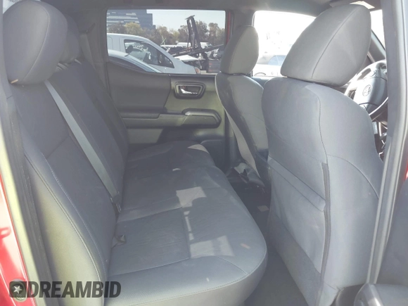 2018 Toyota Tacoma SR5 with VIN 3TMAZ5CN2JM067292, listed as a IAAI auction lot 41851959 with 70,988 mi miles and . Bid and sale history available at DreamBid. Image 8.