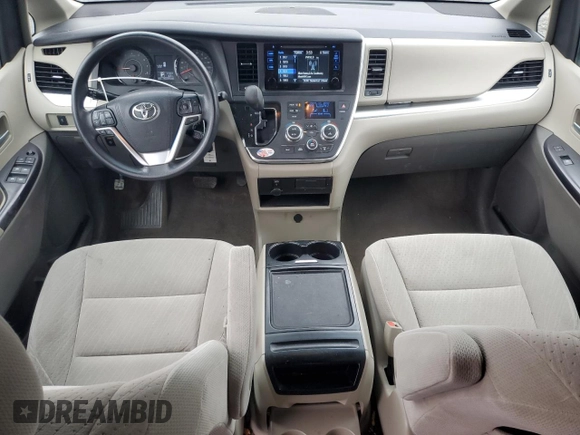 2017 Toyota Sienna LE with VIN 5TDJZ3DC8HS149992, listed as a Copart auction lot 51878725 with 90,299 mi miles and Salvage title. Bid and sale history available at DreamBid. Image 8.