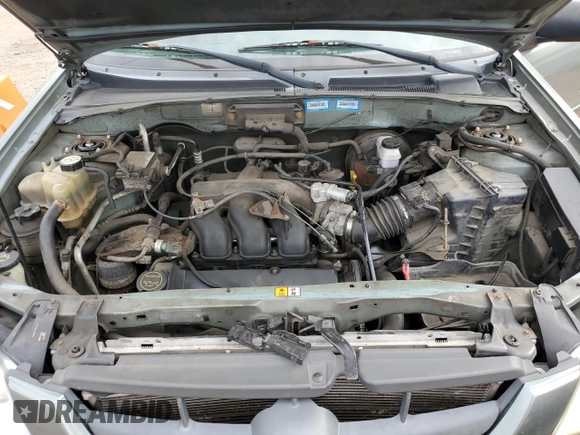 2003 Mazda Tribute LX with VIN 4F2YZ94123KM49852, listed as a Copart auction lot 71779054 with 263,938 mi miles and Salvage Title. Bid and sale history available at carsss.com. Image 12.