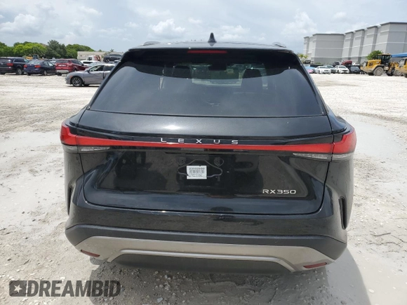 2023 Lexus RX 350 z VIN 2T2BAMBA3PC004378, wystawiony jako Copart lot #63559135 z przebiegiem 18 609 mil mil oraz Czysty tytuł • Clean title. Historia ofert i sprzedaży dostępna na DreamBid. Obrazek 6.