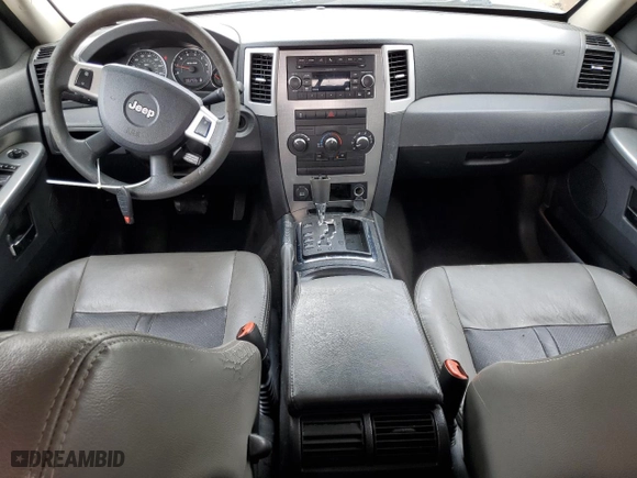 2010 Jeep Grand Cherokee Laredo with VIN 1J4PS4GK8AC146969, listed as a Copart auction lot 51705335 with 219,069 mi miles and Salvage Title. Bid and sale history available at carsss.com. Image 8.