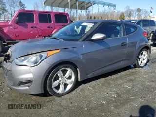 2012 Hyundai Veloster w/Black Int с VIN KMHTC6AD7CU069365, выставлен на аукционе Copart как лот 42499465 с пробегом 99 951 миль миль и Списание • Salvage title. История ставок и продаж доступна на DreamBid. Изображение 1.