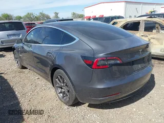 2019 Tesla Model 3 Mid Range with VIN 5YJ3E1EA5KF327679, listed as a IAAI auction lot 41804379 with 87,208 mi miles and . Bid and sale history available at DreamBid. Image 3.