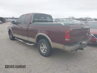 1998 Ford F-150 XL with VIN 1FTRX17L9WKA93669, listed as a IAAI auction lot 41531304 with 174,614 mi miles and . Bid and sale history available at DreamBid. Image 3.