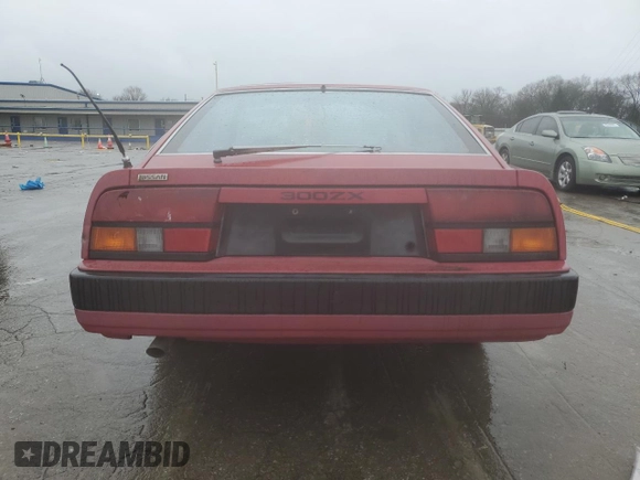 1985 Nissan 300ZX z VIN JN1HZ14S2FX092175, wystawiony jako Copart lot #45348155 z przebiegiem 162 305 mil mil oraz Czysty tytuł • Clean title. Historia ofert i sprzedaży dostępna na DreamBid. Obrazek 6.
