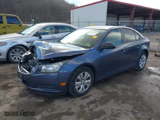 2013 Chevrolet Cruze LS with VIN 1G1PA5SGXD7302629, listed as a IAAI auction lot 41213864 with 106,062 mi miles. Bid and sale history available at carsss.com. Image 2.