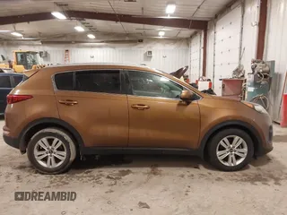 2018 Kia Sportage LX with VIN KNDPM3AC2J7381114, listed as a IAAI auction lot 41214824 with 82,178 mi miles and . Bid and sale history available at carsss.com. Image 13.