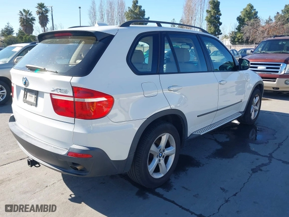 2007 BMW X5 3.0si with VIN 5UXFE43567LY82907, listed as a IAAI auction lot 41499356 with 117,173 mi miles. Bid and sale history available at carsss.com. Image 4.