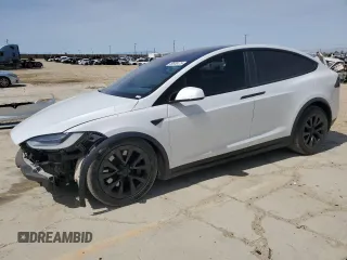 2022 Tesla Model X with VIN 7SAXCBE52NF362994, listed as a Copart auction lot 49850475 with 55,506 mi miles and Salvage Title. Bid and sale history available at DreamBid. Image 1.