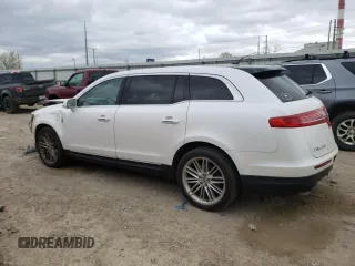 2013 Lincoln MKT EcoBoost with VIN 2LMHJ5AT8DBL56514, listed as a Copart auction lot 53661665 with 140,143 mi miles and Clean Title. Bid and sale history available at carsss.com. Image 2.