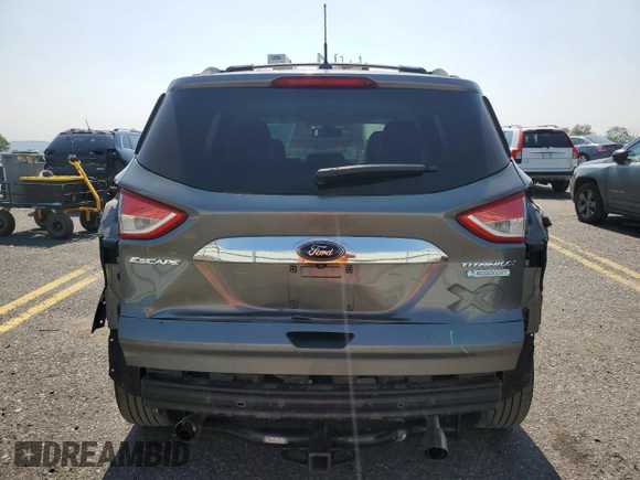 2014 Ford Escape Titanium с VIN 1FMCU0J96EUD41199, выставлен на аукционе Copart как лот 59380245 с пробегом 100 319 миль миль и Списание • Salvage title. История ставок и продаж доступна на DreamBid. Изображение 6.