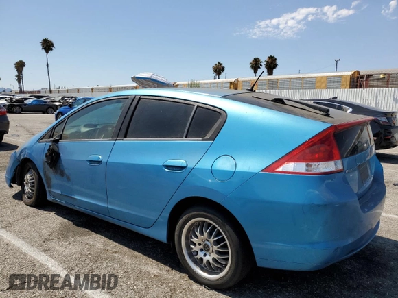 2010 Honda Insight LX with VIN JHMZE2H51AS028849, listed as a Copart auction lot 65547805 with 209,316 mi miles and Salvage title. Bid and sale history available at DreamBid. Image 2.