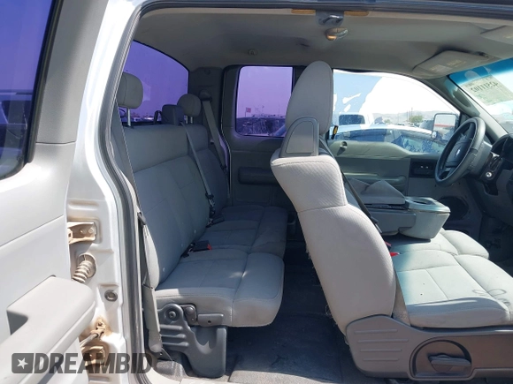 2004 Ford F-150 STX with VIN 1FTRX12W94NB70019, listed as a IAAI auction lot 42511102 with 201,265 mi miles and . Bid and sale history available at DreamBid. Image 8.