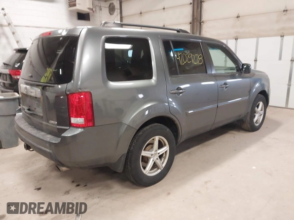 2011 Honda Pilot EX-L with VIN 5FNYF4H55BB039079, listed as a IAAI auction lot 42029278 with 173,216 mi miles. Bid and sale history available at carsss.com. Image 4.