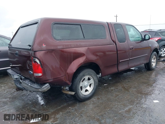 2001 Ford F-150 XL z VIN 1FTZX17291NB67560, wystawiony jako IAAI lot #41582004 z przebiegiem 96 858 mil mil oraz . Historia ofert i sprzedaży dostępna na DreamBid. Obrazek 4.