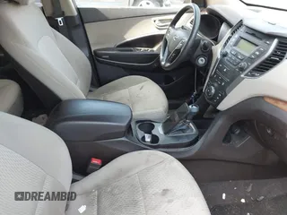 2014 Hyundai Santa Fe with VIN 5XYZTDLB2EG143925, listed as a IAAI auction lot 42243761 with 126,058 mi miles and . Bid and sale history available at DreamBid. Image 5.