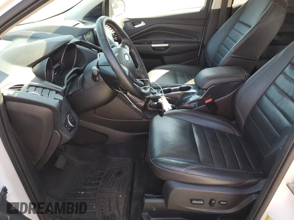 2016 Ford Escape Titanium with VIN 1FMCU9J98GUC00707, listed as a Copart auction lot 54197425 with 95,568 mi miles and Salvage Title. Bid and sale history available at DreamBid. Image 7.