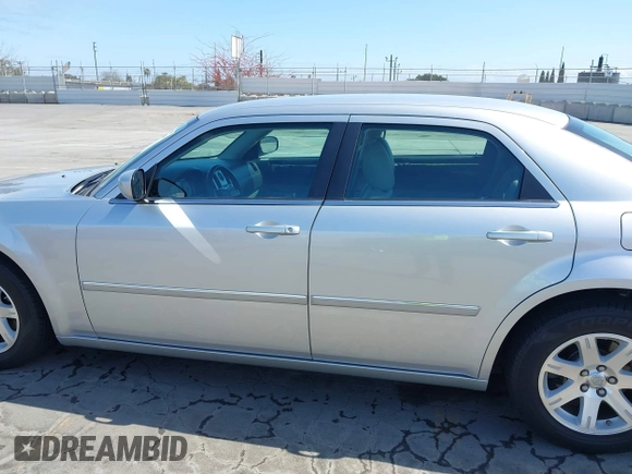 2007 Chrysler 300 Touring with VIN 2C3KA53G57H737815, listed as a IAAI auction lot 42126668 with 46,750 mi miles and . Bid and sale history available at DreamBid. Image 14.