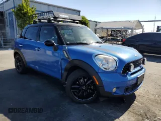 2013 MINI Countryman S with VIN WMWZC3C51DWP23167, listed as a Copart auction lot 63933185 with 72,329 mi miles and Salvage title. Bid and sale history available at DreamBid. Image 4.
