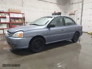 2003 Kia Rio with VIN KNADC125536274171, listed as a IAAI auction lot 41986369 with 59,837 mi miles. Bid and sale history available at carsss.com. Image 2.