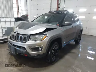 2019 Jeep Compass Trailhawk with VIN 3C4NJDDB9KT765459, listed as a IAAI auction lot 41319891 with 83,860 mi miles and . Bid and sale history available at carsss.com. Image 2.