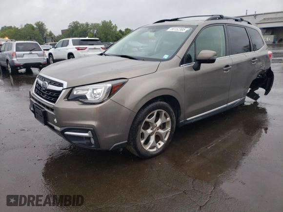 2018 Subaru Forester Touring z VIN JF2SJAWC9JH549911, wystawiony jako Copart lot #58152385 z przebiegiem 91 787 mil mil oraz Szkoda całkowita • Salvage title. Historia ofert i sprzedaży dostępna na DreamBid. Obrazek 1.