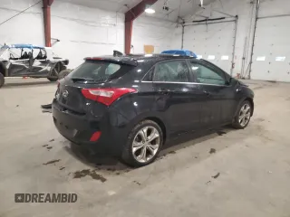 2013 Hyundai Elantra GT with VIN KMHD35LE2DU047179, listed as a Copart auction lot 75450994 with 68,794 mi miles and Salvage Title. Bid and sale history available at carsss.com. Image 3.