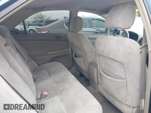 2004 Toyota Camry LE z VIN 4T1BE32K44U832767, wystawiony jako IAAI lot #42041228 z przebiegiem 185 778 mil mil oraz . Historia ofert i sprzedaży dostępna na DreamBid. Obrazek 8.