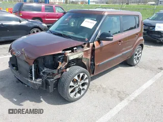 2012 Kia Soul + with VIN KNDJT2A63C7422074, listed as a IAAI auction lot 41911029 with 112,125 mi miles. Bid and sale history available at carsss.com. Image 2.