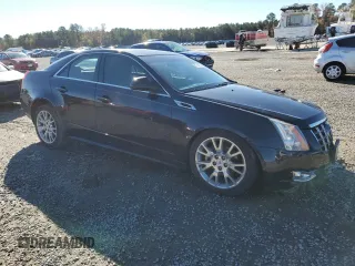 2012 Cadillac CTS Performance with VIN 1G6DK5E33C0158643, listed as a Copart auction lot 81611954 with 158,595 mi miles and Salvage Title. Bid and sale history available at DreamBid. Image 4.