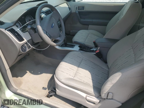 2008 Ford Focus SE z VIN 1FAHP33NX8W141079, wystawiony jako Copart lot #59759325 z przebiegiem 71 522 mil mil oraz Szkoda całkowita • Salvage title. Historia ofert i sprzedaży dostępna na DreamBid. Obrazek 7.