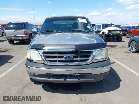 2002 Ford F-150 XLT with VIN 1FTRW07L22KB41794, listed as a IAAI auction lot 42072478 with 116,252 mi miles and . Bid and sale history available at DreamBid. Image 6.