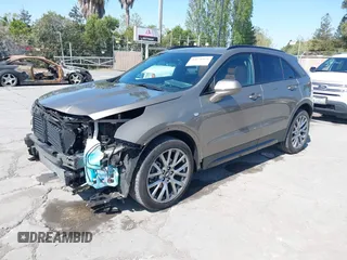 2020 Cadillac XT4 FWD Sport with VIN 1GYFZER4XLF032646, listed as a IAAI auction lot 42078928 with 11,987 mi miles and . Bid and sale history available at DreamBid. Image 2.