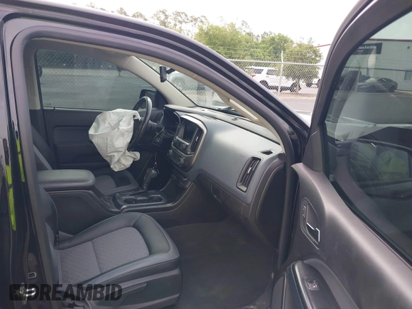 2021 Chevrolet Colorado 4WD Z71 with VIN 1GCGTDEN5M1190797, listed as a IAAI auction lot 42473079 with 77,290 mi miles and . Bid and sale history available at DreamBid. Image 5.