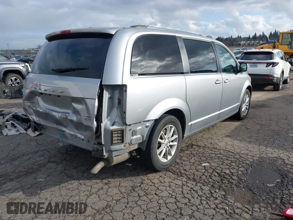 2019 Dodge Grand Caravan SXT with VIN 2C4RDGCG0KR786940, listed as a IAAI auction lot 41648332 with 96,427 mi miles and . Bid and sale history available at DreamBid. Image 4.