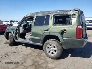 2007 Jeep Commander Sport with VIN 1J8HG48K27C663745, listed as a Copart auction lot 75741314 with 194,534 mi miles and Salvage Title. Bid and sale history available at carsss.com. Image 2.