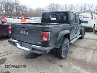 2023 Jeep Gladiator Overland with VIN 1C6HJTFG4PL564093, listed as a IAAI auction lot 41594203 with 37,740 mi miles and . Bid and sale history available at DreamBid. Image 4.