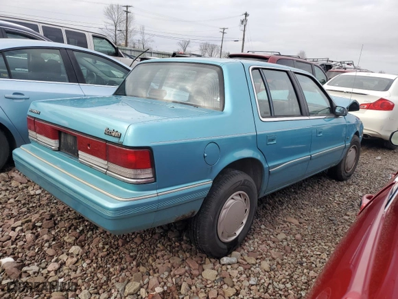 1992 Plymouth Acclaim with VIN 1P3XA4631NF248220, listed as a Copart auction lot 84113754 with 117489 miles and Salvage Title. Bid and sale history available at carsss.com. Image 3.