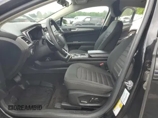 2018 Ford Fusion SE z VIN 3FA6P0LU8JR264630, wystawiony jako Copart lot #57036345 z przebiegiem 234 757 mil mil oraz Szkoda całkowita • Salvage title. Historia ofert i sprzedaży dostępna na DreamBid. Obrazek 7.