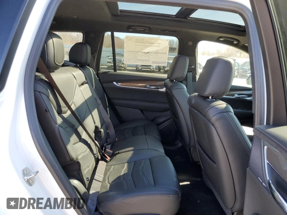 2025 Cadillac XT6 AWD Sport z VIN 1GYKPHRS5SZ101521, wystawiony jako Copart lot #48552185 z przebiegiem 262 mil mil oraz Szkody całkowita. Historia ofert i sprzedaży dostępna na DreamBid. Obrazek 11.