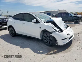 2024 Tesla Model Y Long Range z VIN 7SAYGDEE0RA313929, wystawiony jako Copart lot #59548725 z przebiegiem Nie podano mil oraz Szkoda całkowita • Salvage title. Historia ofert i sprzedaży dostępna na DreamBid. Obrazek 4.